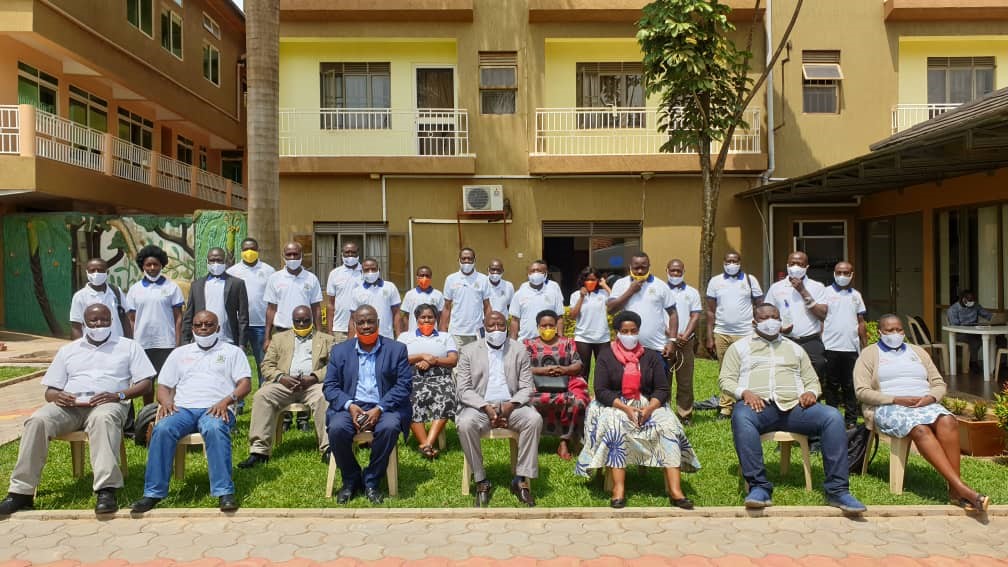 State Minister for Cooperatives at the official closing of the training for Trainees in Seeta along side officials from Ministry of Agriculture Animal industry and Fisheries Image