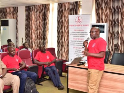 General Secretary CPA – Ivan Asiimwe addressing the Cooperators at the Symposium Image
