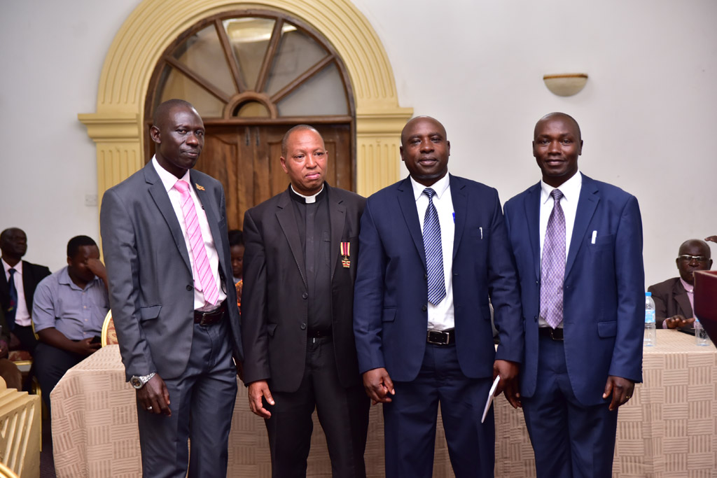 UCA Board Members 2018-2020 from left Mr.Jacan Oyenya Ismail-vice Chairperson, Fr.Safari Emanuel- Treasure, Mr. Jonas Tweyambe – Chairman and HW Sayekwo Emmy Godfrey Board Member Image